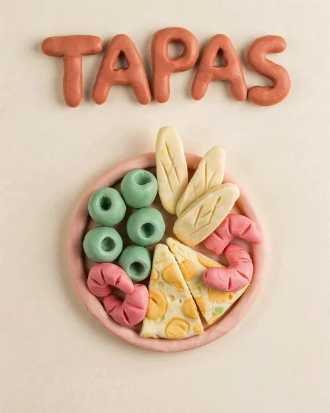 Affiche d'exemple dans le style clay : des tapas modelées en pâte à modeler.